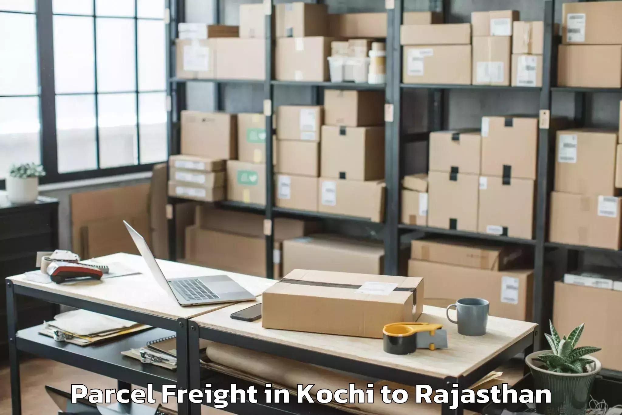 Easy Kochi to Dungarpur Parcel Freight Booking